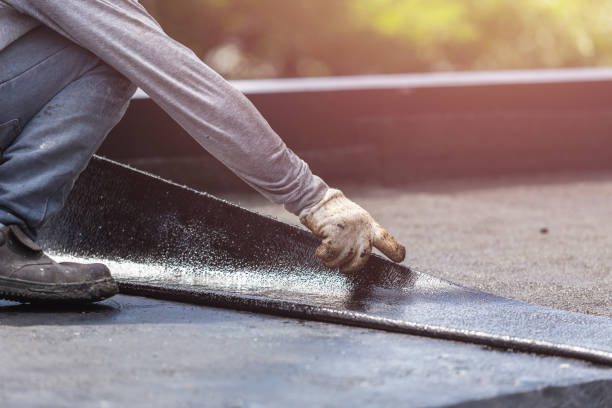 Professional Basement Waterproofing technician working in East Rochester, NY